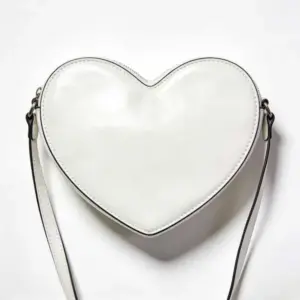 white heart shaped bag
